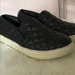 Black Steve Madden slip ons